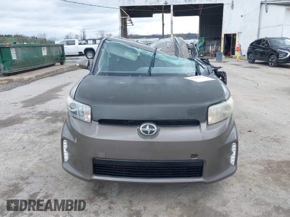2014 Scion xB with VIN JTLZE4FE9EJ050596, listed as a IAAI auction lot 41884572 with 141,896 mi miles. Bid and sale history available at carsss.com. Image 12.