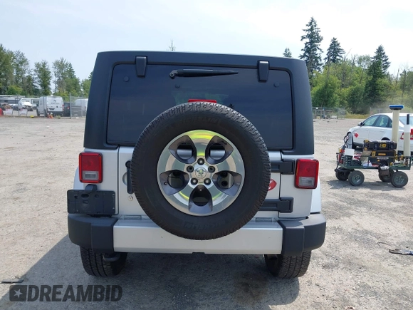 2012 Jeep Wrangler Unlimited Altitude with VIN 1C4HJWEG2CL140059, listed as a IAAI auction lot 42433563 with 189,868 mi miles and . Bid and sale history available at DreamBid. Image 16.