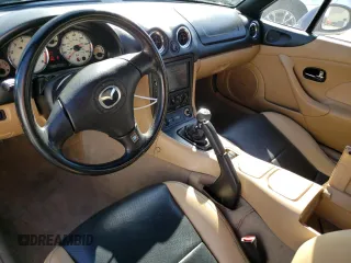 2002 Mazda MX-5 Miata Cloth z VIN JM1NB353820222664, wystawiony jako Copart lot #49701925 z przebiegiem 95 873 mil mil oraz Szkoda całkowita • Salvage title. Historia ofert i sprzedaży dostępna na DreamBid. Obrazek 8.
