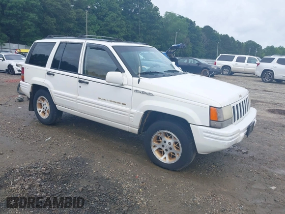 1996 Jeep Grand Cherokee Limited z VIN 1J4GZ78YXTC191527, wystawiony jako IAAI lot #42352616 z przebiegiem 325 927 mil mil oraz . Historia ofert i sprzedaży dostępna na DreamBid. Obrazek 1.