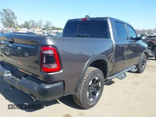 2022 Ram 1500 Rebel z VIN 1C6SRFLT4NN177112, wystawiony jako IAAI lot #42402050 z przebiegiem 26 239 mil mil oraz . Historia ofert i sprzedaży dostępna na DreamBid. Obrazek 4.