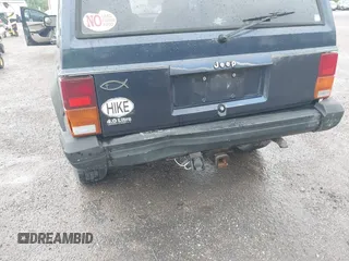 1996 Jeep Cherokee SE z VIN 1J4FJ28S5TL129065, wystawiony jako IAAI lot #42231133 z przebiegiem 225 320 mil mil oraz . Historia ofert i sprzedaży dostępna na DreamBid. Obrazek 6.