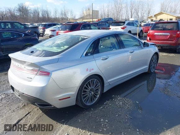 2014 Lincoln MKZ z VIN 3LN6L2J95ER830342, wystawiony jako IAAI lot #41876269 z przebiegiem 137 089 mil mil oraz . Historia ofert i sprzedaży dostępna na DreamBid. Obrazek 4.