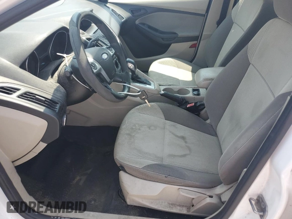 2012 Ford Focus SE z VIN 1FAHP3F24CL427067, wystawiony jako Copart lot #60402005 z przebiegiem 141 810 mil mil oraz Czysty tytuł • Clean title. Historia ofert i sprzedaży dostępna na DreamBid. Obrazek 7.