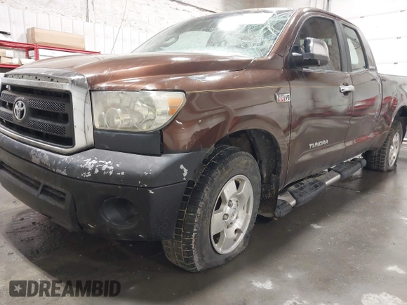2007 Toyota Tundra SR5 with VIN 5TFBT54187X007232, listed as a IAAI auction lot 41848302 with 168,324 mi miles and . Bid and sale history available at DreamBid. Image 6.