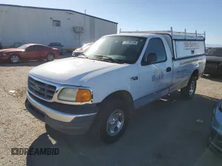 2004 Ford F-150 XL with VIN 2FTRF18234CA36992, listed as a Copart auction lot 72199124 with 168,092 mi miles and Salvage title. Bid and sale history available at DreamBid. Image 1.