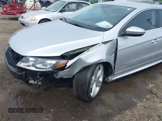 2014 Volkswagen CC Sport z VIN WVWBN7AN9EE524674, wystawiony jako IAAI lot #42252264 z przebiegiem 118 378 mil mil oraz . Historia ofert i sprzedaży dostępna na DreamBid. Obrazek 6.