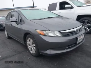 2012 Honda Civic Sdn LX with VIN 19XFB2F52CE321715, listed as a IAAI auction lot 42028441 with 198,494 mi miles. Bid and sale history available at carsss.com. Image 1.