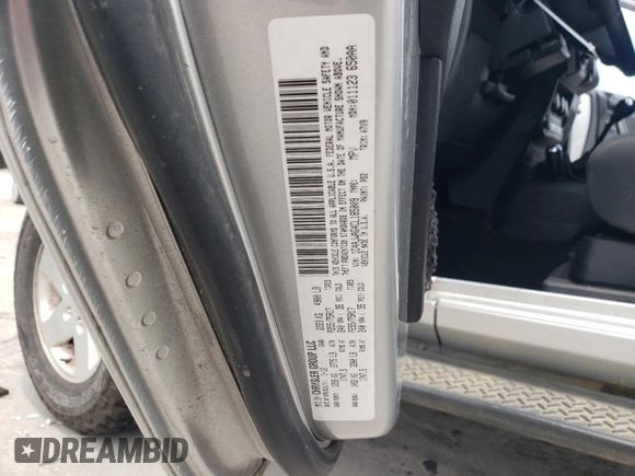 2012 Jeep Wrangler Sport z VIN 1C4AJWAG4CL185009, wystawiony jako Copart lot #61203395 z przebiegiem 93 534 mil mil oraz Szkoda całkowita • Salvage title. Historia ofert i sprzedaży dostępna na DreamBid. Obrazek 13.