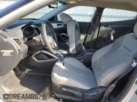 2012 Hyundai Veloster w/Black Int with VIN KMHTC6AD6CU032033, listed as a Copart auction lot 52614775 with 173,476 mi miles and Salvage title. Bid and sale history available at DreamBid. Image 7.