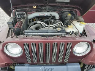 2001 Jeep Wrangler Sahara z VIN 1J4FA59SX1P305100, wystawiony jako Copart lot #58606685 z przebiegiem 76 856 mil mil oraz Czysty tytuł • Clean title. Historia ofert i sprzedaży dostępna na DreamBid. Obrazek 11.