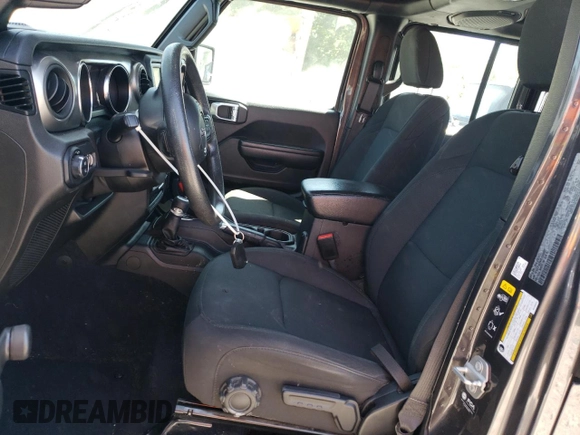 2021 Jeep Gladiator Freedom с VIN 1C6HJTAG4ML580023, выставлен на аукционе Copart как лот 57586475 с пробегом 64 022 миль миль и Списание • Salvage title. История ставок и продаж доступна на DreamBid. Изображение 7.