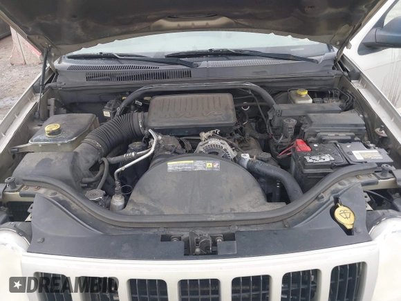 2007 Jeep Grand Cherokee Laredo z VIN 1J8HR48P77C548578, wystawiony jako IAAI lot #41974603 z przebiegiem 179 280 mil mil oraz . Historia ofert i sprzedaży dostępna na DreamBid. Obrazek 10.