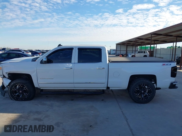 2016 Chevrolet Silverado 1500 LTZ with VIN 3GCUKSEJ0GG221628, listed as a IAAI auction lot 41276045 with 153,476 mi miles. Bid and sale history available at carsss.com. Image 15.