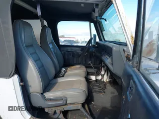1995 Jeep Wrangler S with VIN 1J4FY19P6SP210468, listed as a IAAI auction lot 41882009 with 133,705 mi miles. Bid and sale history available at carsss.com. Image 5.