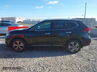 2017 Nissan Rogue SL with VIN 5N1AT2MV5HC769838, listed as a IAAI auction lot 40922008 with 91,906 mi miles. Bid and sale history available at carsss.com. Image 14.