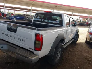 2003 Nissan Frontier XE with VIN 1N6ED27T83C455720, listed as a IAAI auction lot 41732993 with 140,884 mi miles and . Bid and sale history available at DreamBid. Image 4.