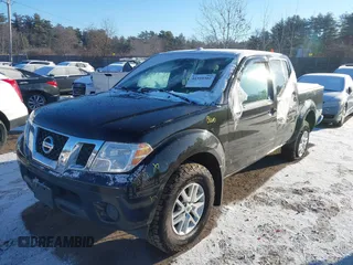 2018 Nissan Frontier SV with VIN 1N6AD0EV0JN718047, listed as a IAAI auction lot 41310302 with 103,488 mi miles and . Bid and sale history available at DreamBid. Image 2.
