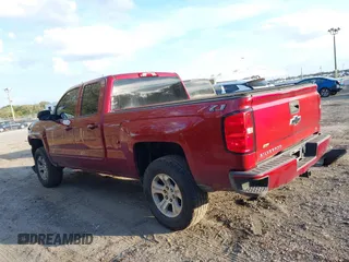 2019 Chevrolet Silverado 1500 LT with VIN 2GCVKPEC2K1180858, listed as a IAAI auction lot 41513814 with 103,765 mi miles and . Bid and sale history available at DreamBid. Image 14.