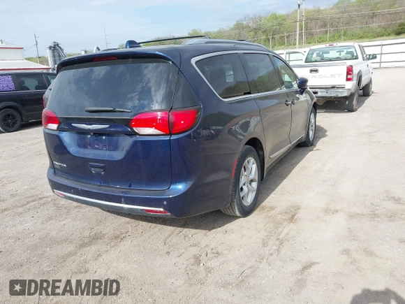 2018 Chrysler Pacifica Touring L Plus with VIN 2C4RC1EGXJR115464, listed as a IAAI auction lot 42013816 with 129,881 mi miles and . Bid and sale history available at DreamBid. Image 4.