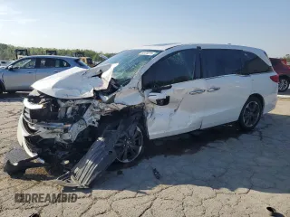 2021 Honda Odyssey Elite z VIN 5FNRL6H97MB009998, wystawiony jako Copart lot #53475215 z przebiegiem Nie podano mil oraz Szkoda całkowita • Salvage title. Historia ofert i sprzedaży dostępna na DreamBid. Obrazek 1.