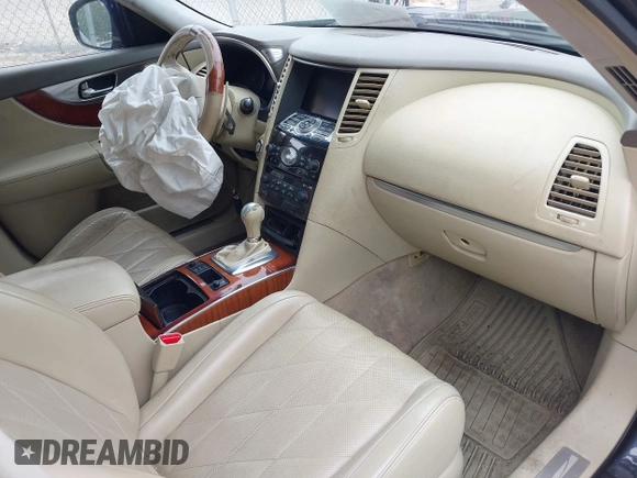 2009 Infiniti FX z VIN JNRAS18W39M152180, wystawiony jako IAAI lot #42226853 z przebiegiem 268 413 mil mil oraz . Historia ofert i sprzedaży dostępna na DreamBid. Obrazek 5.