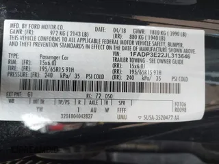 2018 Ford Focus S with VIN 1FADP3E22JL313646, listed as a IAAI auction lot 41903662 with 37,244 mi miles. Bid and sale history available at carsss.com. Image 9.