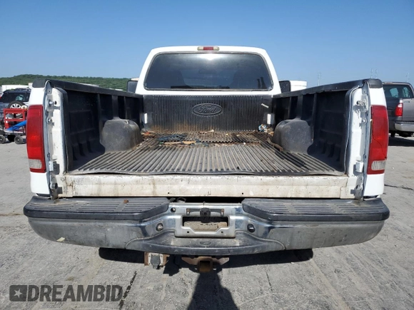 2004 Ford F-250 XL with VIN 1FTNF20L94EA54075, listed as a Copart auction lot 56751955 with 303,008 mi miles and Salvage title. Bid and sale history available at DreamBid. Image 6.