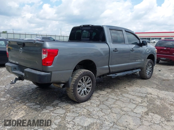 2016 Nissan Titan S with VIN 1N6BA1F1XGN518154, listed as a IAAI auction lot 42249342 with 168,538 mi miles and . Bid and sale history available at DreamBid. Image 4.