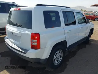 2014 Jeep Patriot Sport with VIN 1C4NJPBB4ED916030, listed as a IAAI auction lot 41690863 with 205,458 mi miles. Bid and sale history available at carsss.com. Image 4.