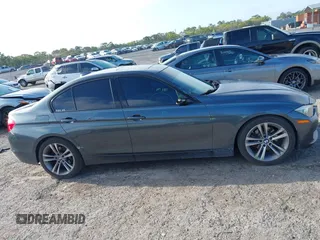 2014 BMW 3 Series 328i with VIN WBA3C1C52EK116956, listed as a IAAI auction lot 41907691 with 125,856 mi miles. Bid and sale history available at carsss.com. Image 13.