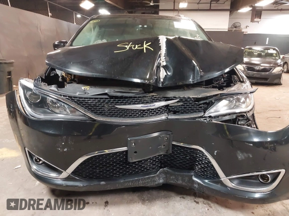 2020 Chrysler Pacifica Touring L with VIN 2C4RC1BG2LR280156, listed as a IAAI auction lot 42182406 with 105,038 mi miles and . Bid and sale history available at DreamBid. Image 6.