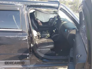 2014 Jeep Patriot Latitude with VIN 1C4NJPFA6ED680773, listed as a IAAI auction lot 41569916 with 135,590 mi miles and . Bid and sale history available at carsss.com. Image 5.