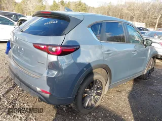 2022 Mazda CX-5 2.5 S Preferred Package with VIN JM3KFBCM1N0562277, listed as a IAAI auction lot 41421324 with 68,528 mi miles. Bid and sale history available at carsss.com. Image 4.