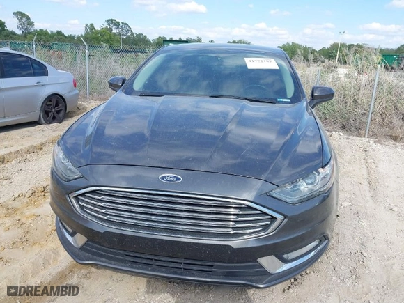 2018 Ford Fusion Hybrid SE with VIN 3FA6P0LUXJR119735, listed as a IAAI auction lot 41772187 with NaN miles. Bid and sale history available at carsss.com. Image 12.