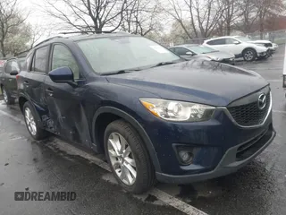 2014 Mazda CX-5 Grand Touring with VIN JM3KE4DY8E0366644, listed as a IAAI auction lot 41971438 with 135,644 mi miles and . Bid and sale history available at carsss.com. Image 1.