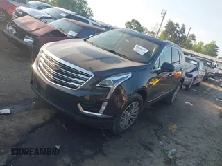 2019 Cadillac XT5 Luxury FWD z VIN 1GYKNCRS2KZ251207, wystawiony jako IAAI lot #42066271 z przebiegiem 128 226 mil mil oraz . Historia ofert i sprzedaży dostępna na DreamBid. Obrazek 17.