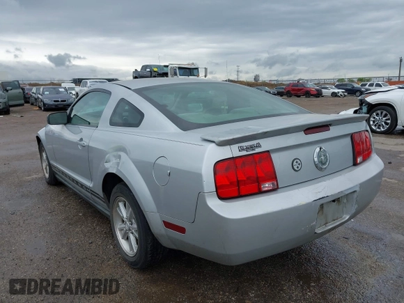 2007 Ford Mustang Deluxe with VIN 1ZVFT80N575245396, listed as a IAAI auction lot 41889599 with 319,148 mi miles. Bid and sale history available at carsss.com. Image 3.
