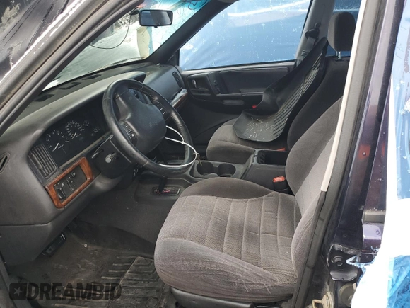 1997 Jeep Grand Cherokee Laredo with VIN 1J4GZ58Y0VC547880, listed as a Copart auction lot 79866684 with 0 mi miles and Salvage Title. Bid and sale history available at carsss.com. Image 7.