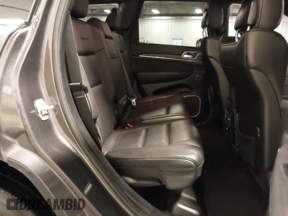 2015 Jeep Grand Cherokee Summit with VIN 1C4RJFJG4FC634129, listed as a IAAI auction lot 42481877 with 149,087 mi miles and . Bid and sale history available at DreamBid. Image 8.