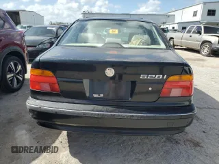 2000 BMW 5 Series 528iA with VIN WBADM6340YGU16735, listed as a Copart auction lot 77249644 with 0 mi miles and Salvage Title. Bid and sale history available at carsss.com. Image 6.