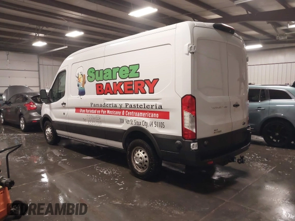 2024 Ford Transit Cargo with VIN 1FTBR2C81RKA01686, listed as a IAAI auction lot 41100566 with 74,842 mi miles and . Bid and sale history available at DreamBid. Image 3.