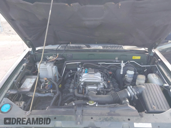 2000 Isuzu Trooper S z VIN JACDS58X9Y7J08094, wystawiony jako IAAI lot #41818546 z przebiegiem 154 927 mil mil oraz . Historia ofert i sprzedaży dostępna na DreamBid. Obrazek 10.