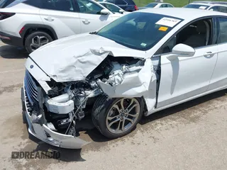 2020 Ford Fusion SEL with VIN 3FA6P0CD3LR152711, listed as a IAAI auction lot 42516763 with 97,073 mi miles and . Bid and sale history available at DreamBid. Image 6.