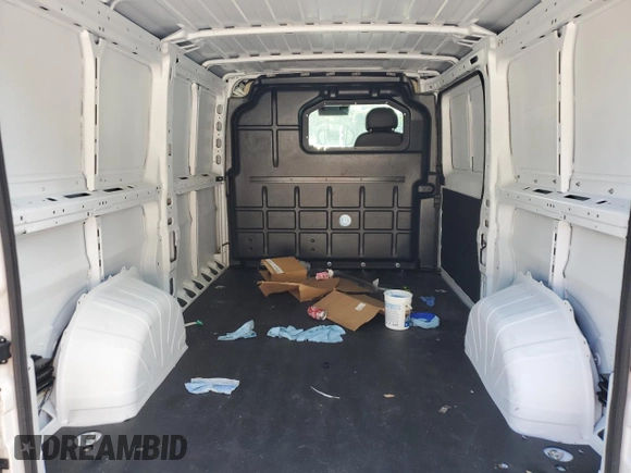 2023 Ram ProMaster Cargo with VIN 3C6LRVVG5PE589982, listed as a Copart auction lot 65990094 with 11,410 mi miles and Salvage Title. Bid and sale history available at DreamBid. Image 10.