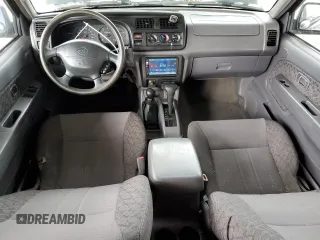 2000 Nissan Xterra XE z VIN 5N1ED28Y1YC549518, wystawiony jako Copart lot #49359015 z przebiegiem 179 001 mil mil oraz Szkoda całkowita • Salvage title. Historia ofert i sprzedaży dostępna na DreamBid. Obrazek 8.