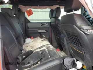 2023 Ford Bronco z VIN 1FMEE5DP6PLC01420, wystawiony jako Copart lot #52883195 z przebiegiem 11 620 mil mil oraz Szkoda całkowita • Salvage title. Historia ofert i sprzedaży dostępna na DreamBid. Obrazek 10.