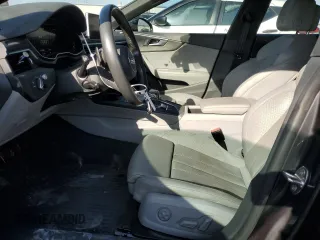 2018 Audi A5 Sportback Prestige z VIN WAUFNCF50JA128442, wystawiony jako Copart lot #86828644 z przebiegiem 101 650 mil mil oraz Szkoda całkowita • Salvage title. Historia ofert i sprzedaży dostępna na DreamBid. Obrazek 7.