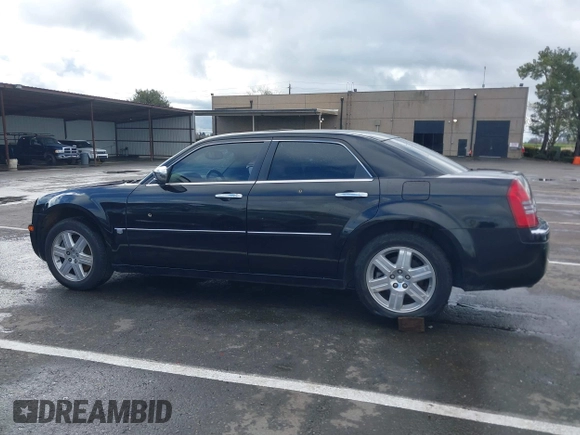 2006 Chrysler 300 C with VIN 2C3LK63H66H142437, listed as a IAAI auction lot 41751890 with 57,374 mi miles. Bid and sale history available at carsss.com. Image 14.