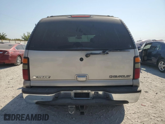 2004 Chevrolet Tahoe LT with VIN 1GNEC13ZX4R306385, listed as a Copart auction lot 75694864 with 168,142 mi miles and Salvage Title. Bid and sale history available at carsss.com. Image 6.